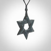 Star of David pendant hand carved from New Zealand Green Jade. Made by NZ Pacific and for sale worldwide. Postage is included in the price.